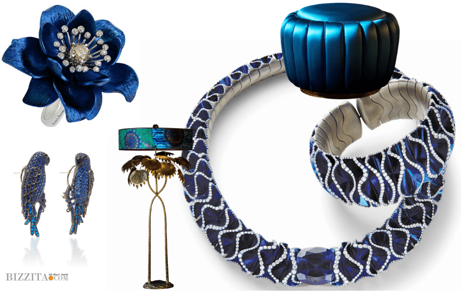 Vhernier necklace and bracelet set beside a gold and titanium flower ring and parrot earrings
